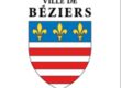 Ecusson de la ville de Béziers comportant 7 bandes blanches et rouges qui soulignent des fleurs de lys or sur fond bleu